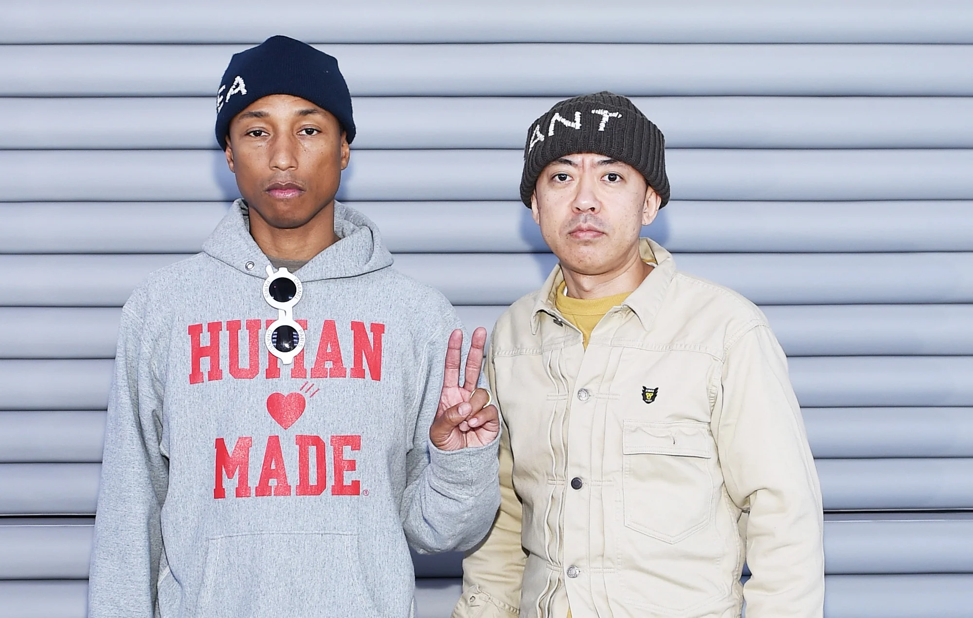 Pharell Williams and Nigo standing next to eachother