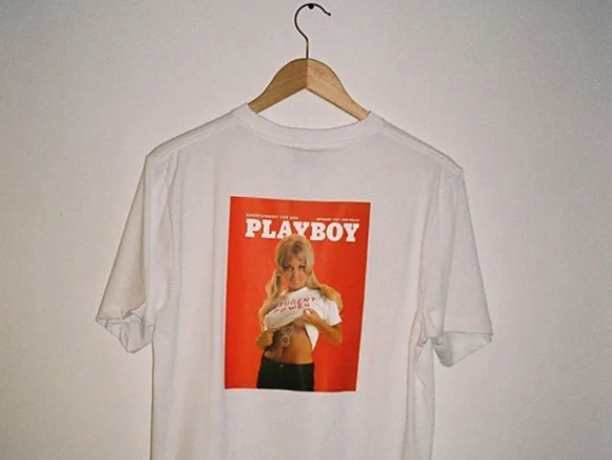 a white tshirt with a playboy magazine cover on the front