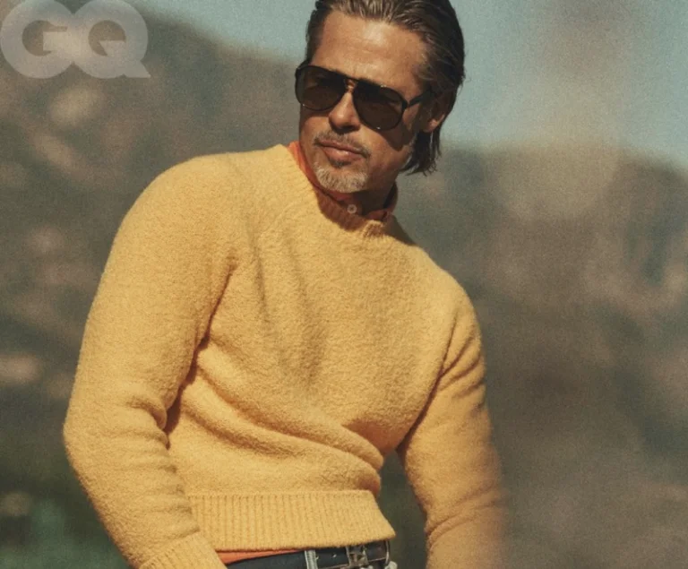 Brad Pitt in a yellow sweater